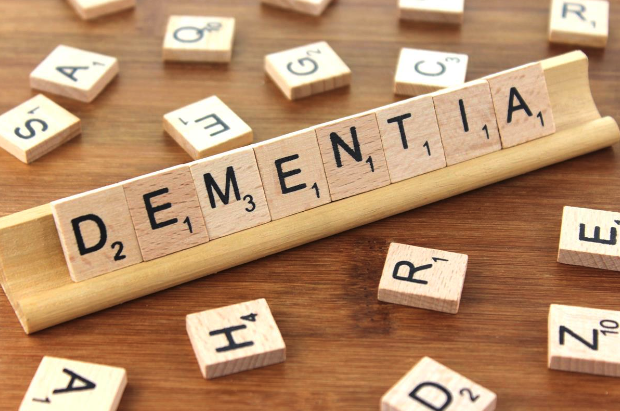 scrabble board spelling out dementia